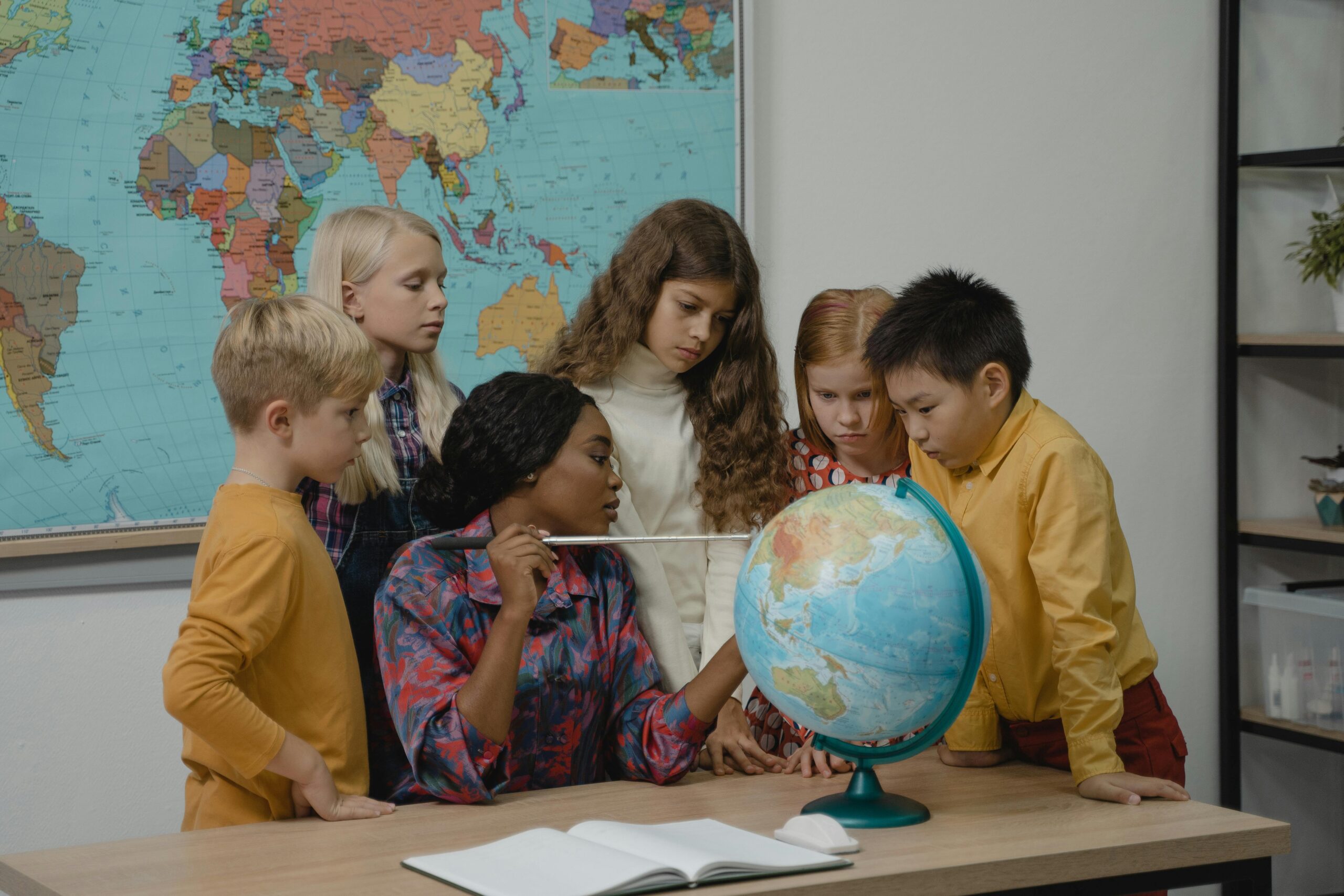 A classroom scene showing students engaged in learning, highlighting the importance of education in daily life.